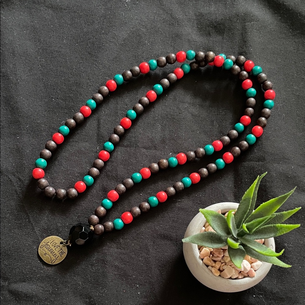 Hand assembled beaded necklace love the journey